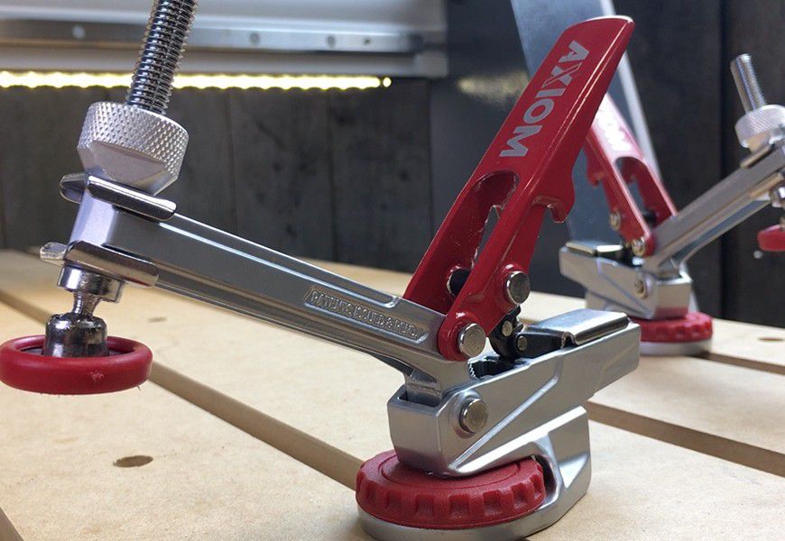 axiom autoadjust holddown clamps